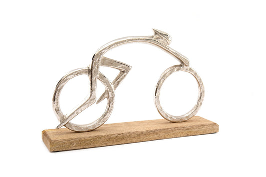 silver-cyclist-on-a-wooden-base