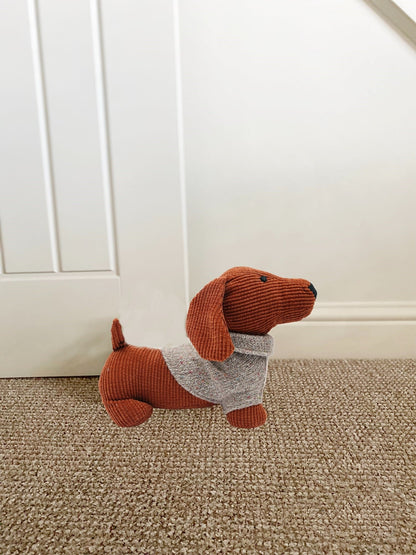 orange-dog-with-jumper-doorstop